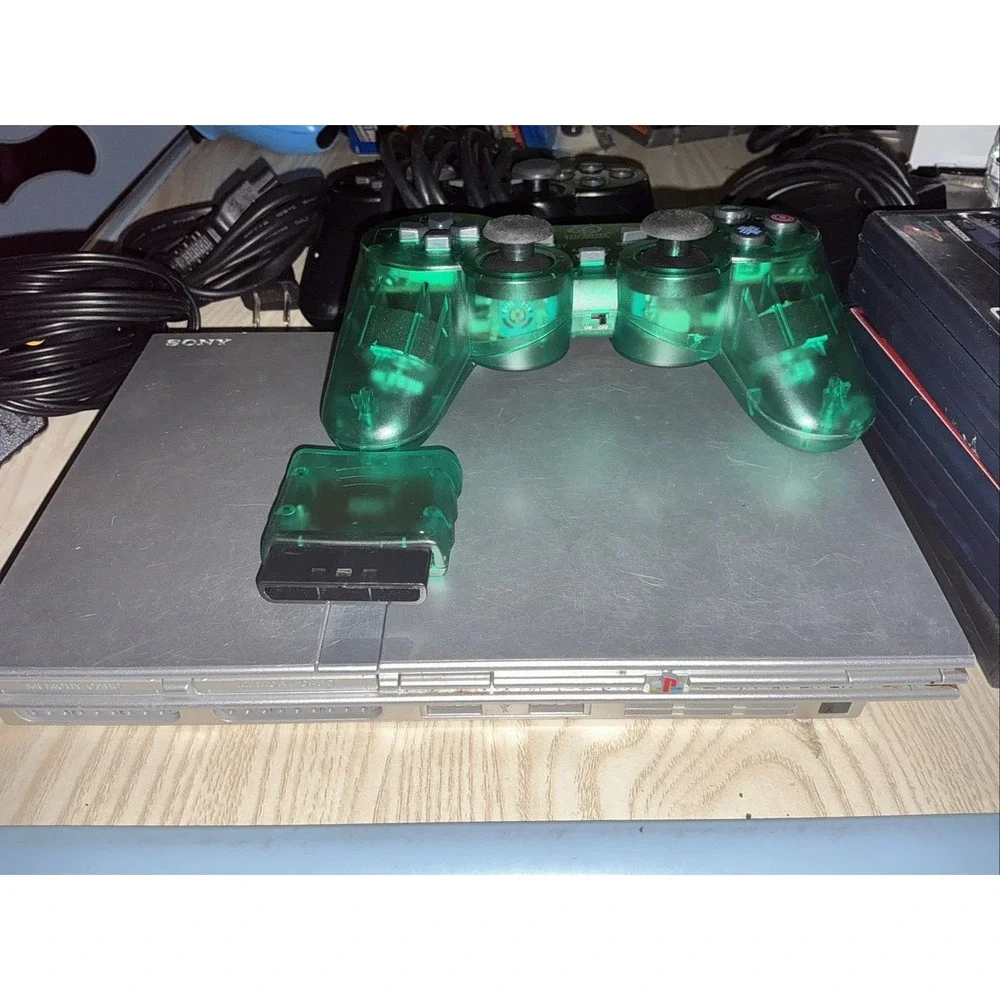 playstation 2 console,‎ 1 Wireless Controller 1 Reg Controller ,5 Games